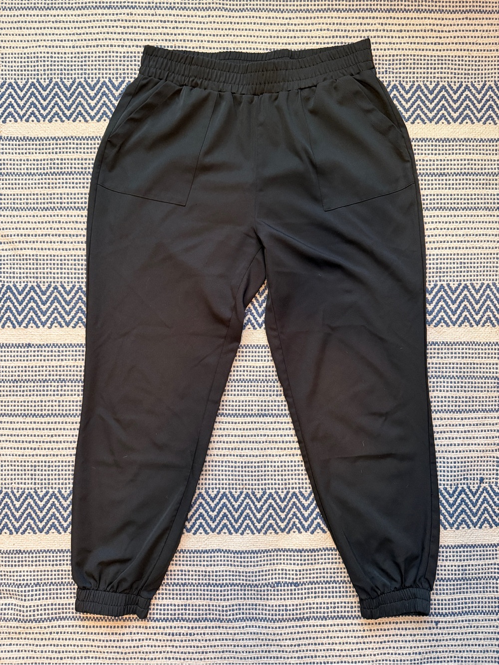 Women’s Black Elastic-Waist Jogger Pants, size medium.